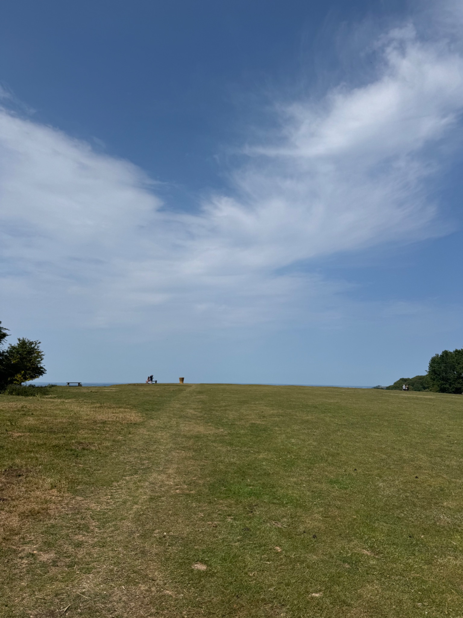 Cotswold landscape under blue sky